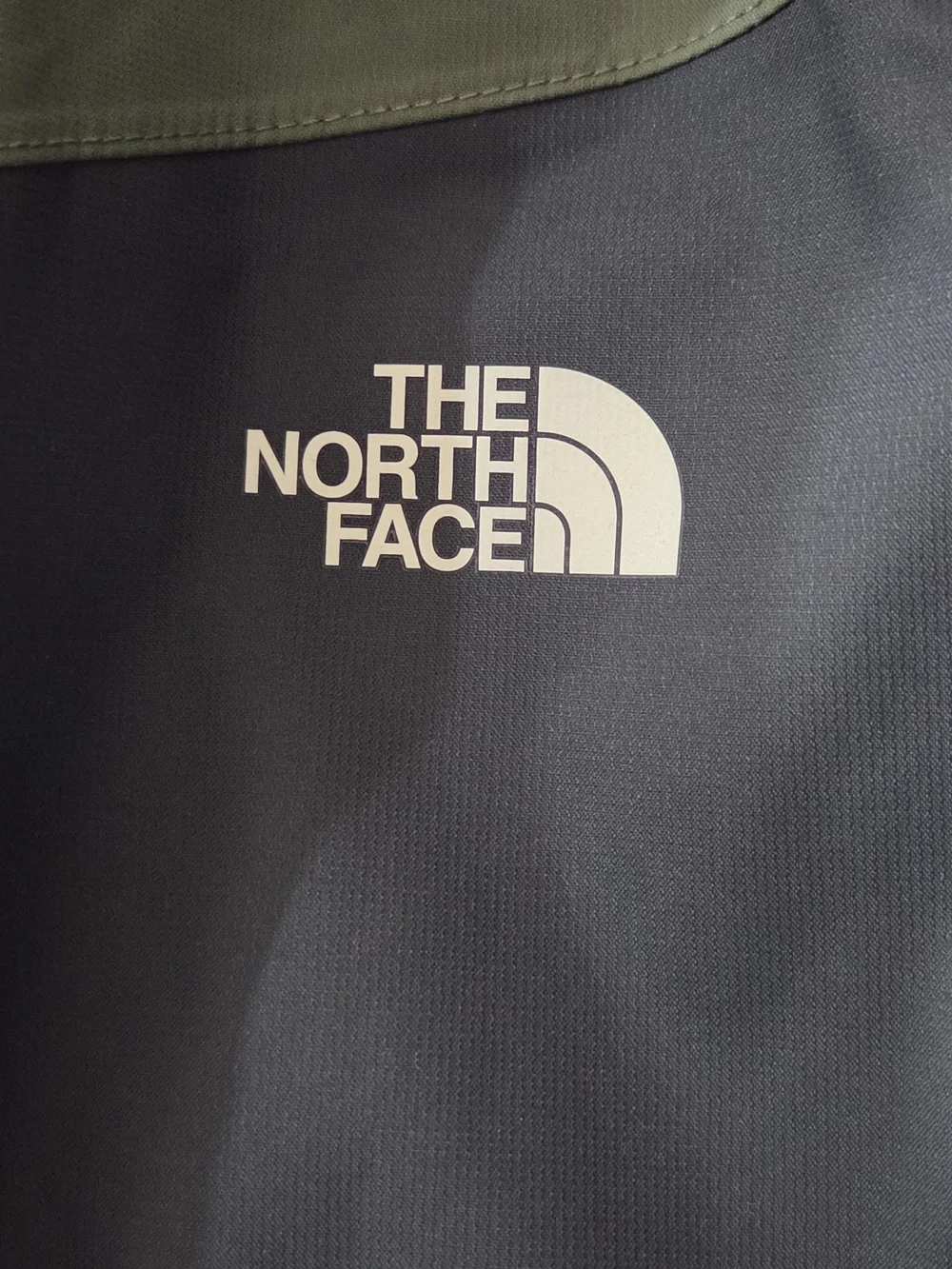 The North Face Men’s Two-Tone Green & Black Waterproof Jacket